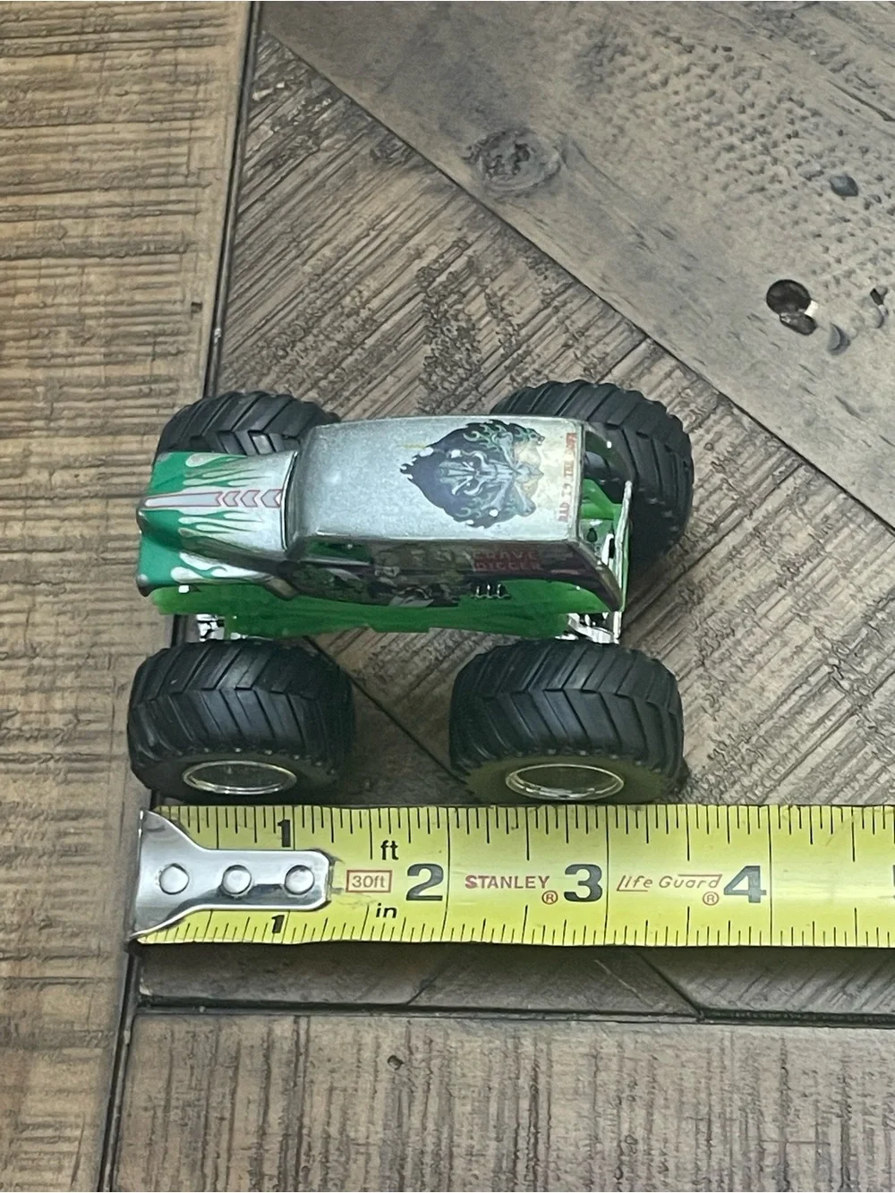 Vintage Hot Wheels Monster Jam 1:64 Grave Digger Grim Chrome Silver Truck (2004)